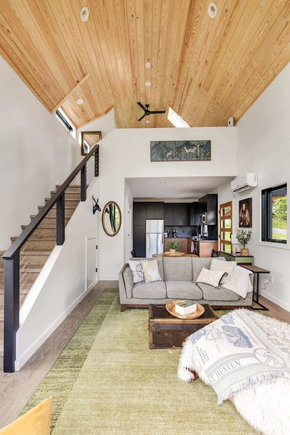 Stylish and comfortable, the living space invites you to kick back and relax. Perfect for cozy evenings in or enjoying a quiet moment together.