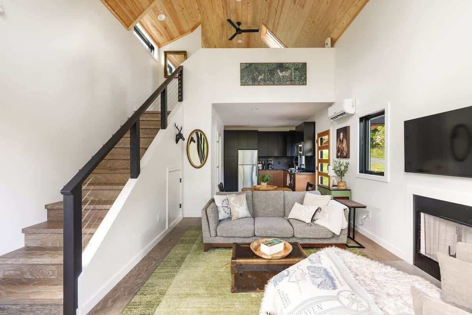 The open-concept design seamlessly connects the kitchen, dining, and living areas. Creating an inviting space to cook, gather, and relax together.
