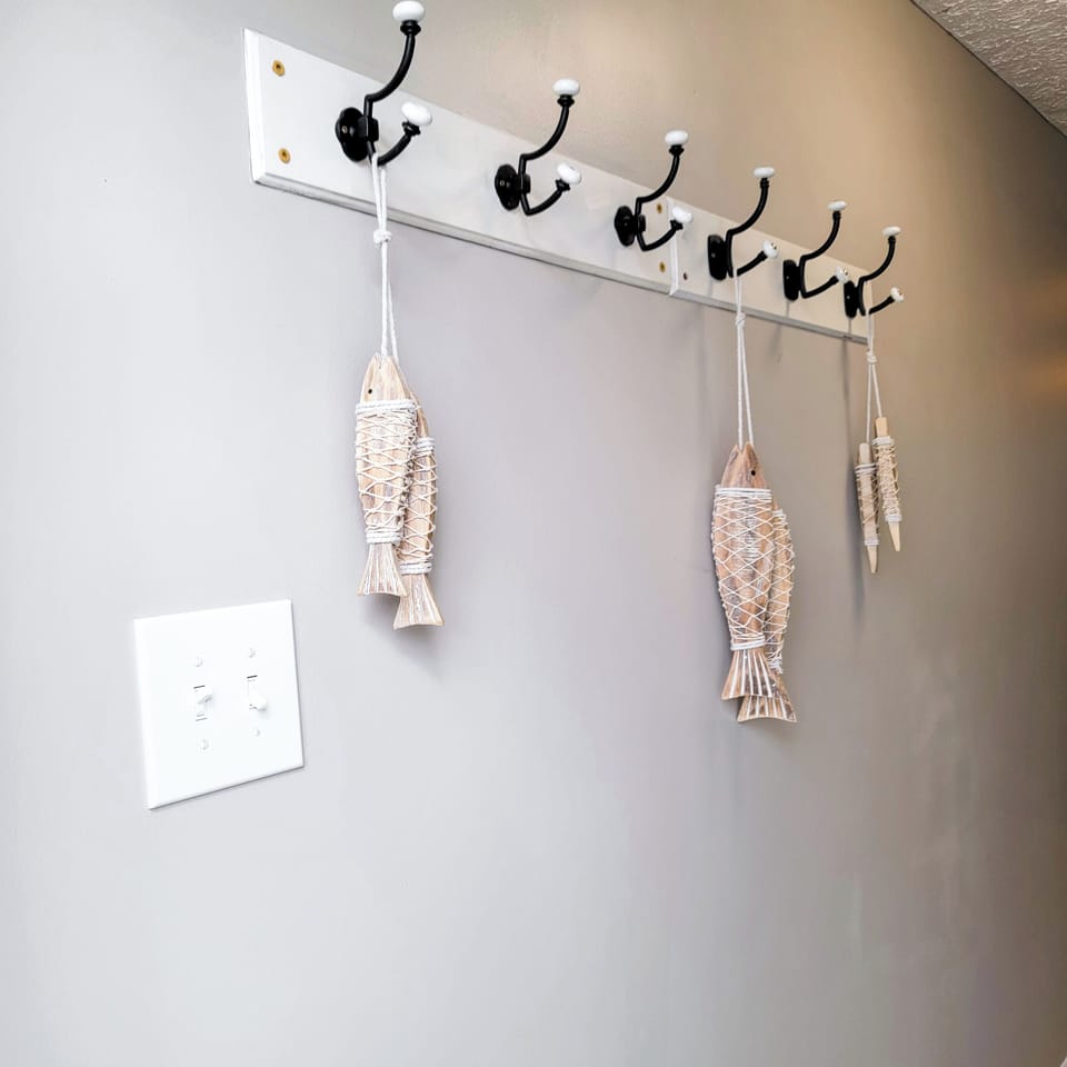 Spacious entryway with lots of room to hang your coat and gear on the coat rack.