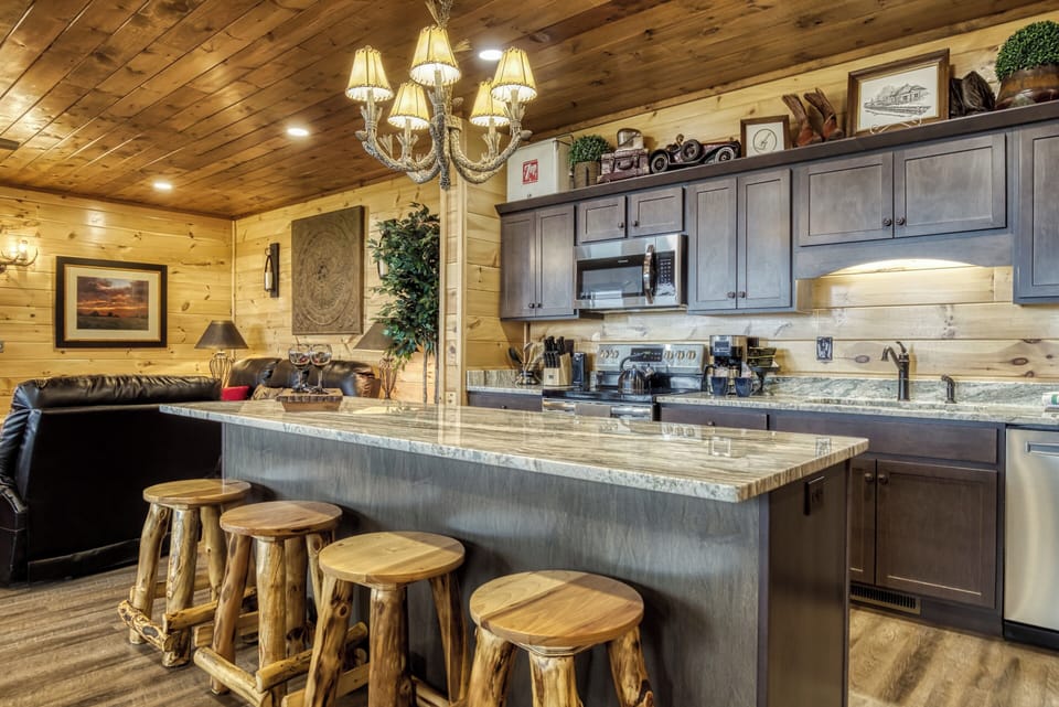 Cabin with a View in the Smokies "Mountown Moments Vista" - Kitchen island, fully furnished kitchen, and living room