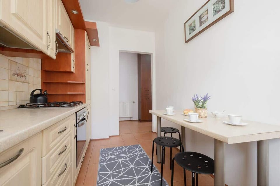 Separate kitchen with a kettle.