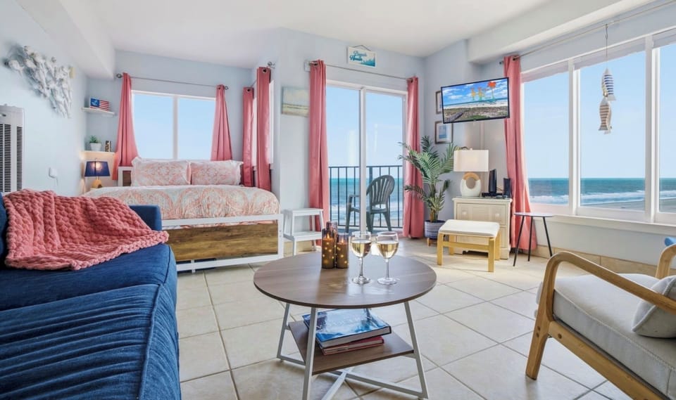 Gather around the table or relax on the sofa as oceanfront views fill the space with soft natural light. An intimate, elevated spot for slow mornings and easy evenings. ⭐