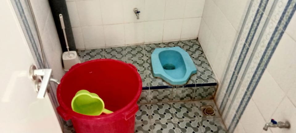 Basic Single Room | Bathroom | Shower, towels, soap