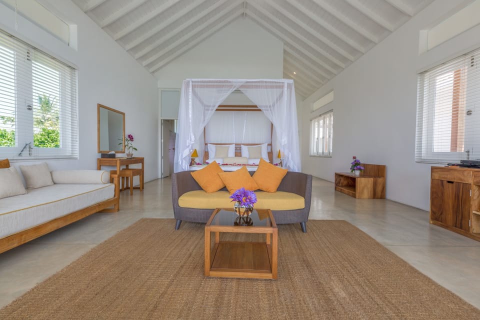 Ocean Signature Suite | Living area | 32-inch LED TV with satellite channels, TV