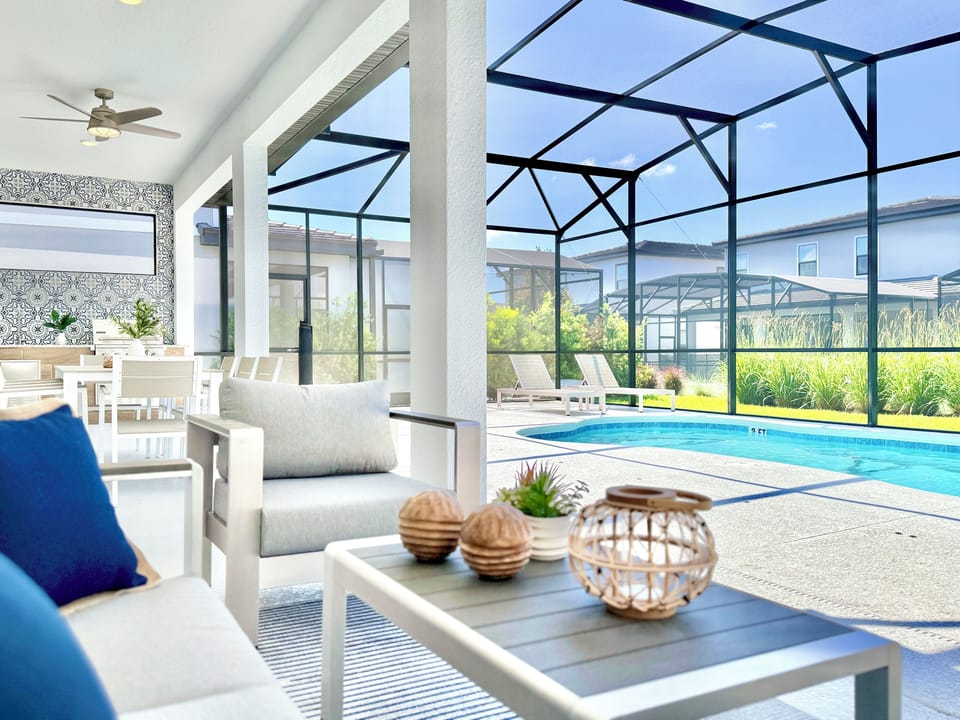 Indoor pool, cozy seating, summer kitchen. Perfect retreat!