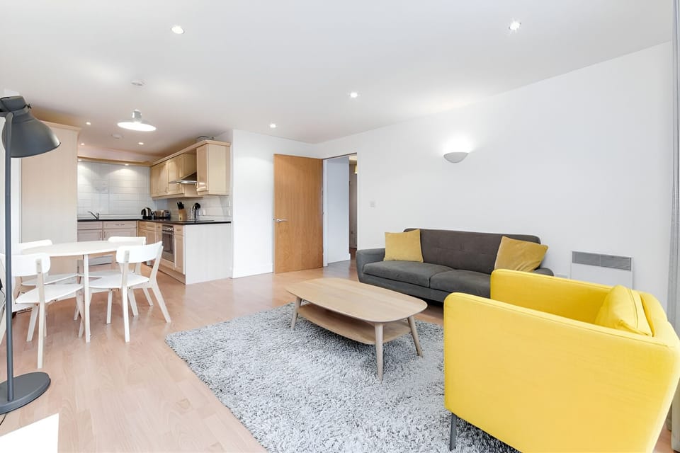 Deluxe Apartment | Living area | 32-inch LCD TV with satellite channels