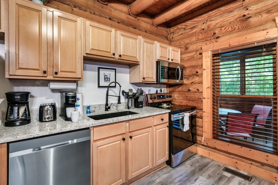 Fully equipped kitchen allows for you to cook meals in the cabin
