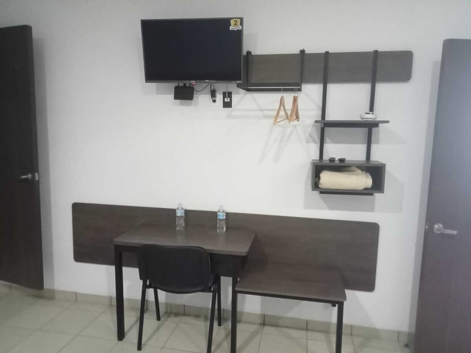 Standard Room, 1 Queen Bed | Desk, laptop workspace, iron/ironing board, WiFi (free)