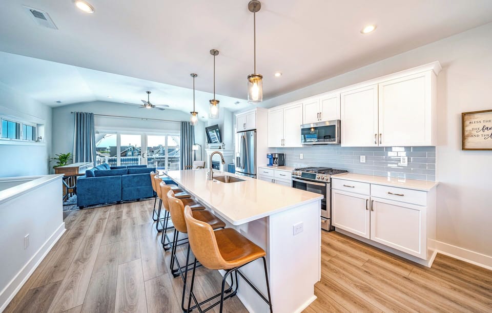 Kitchen island with five bar stools