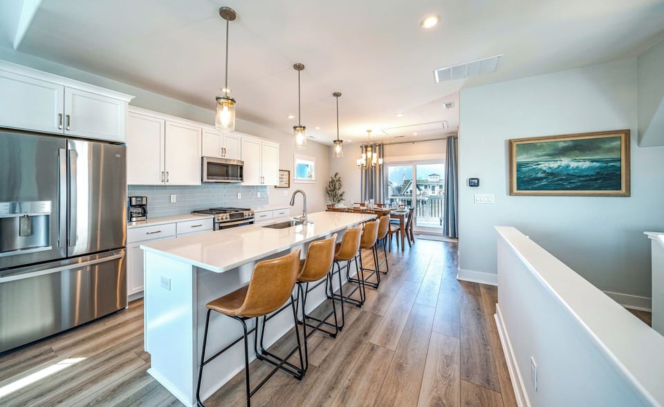 Kitchen island with five bar stools