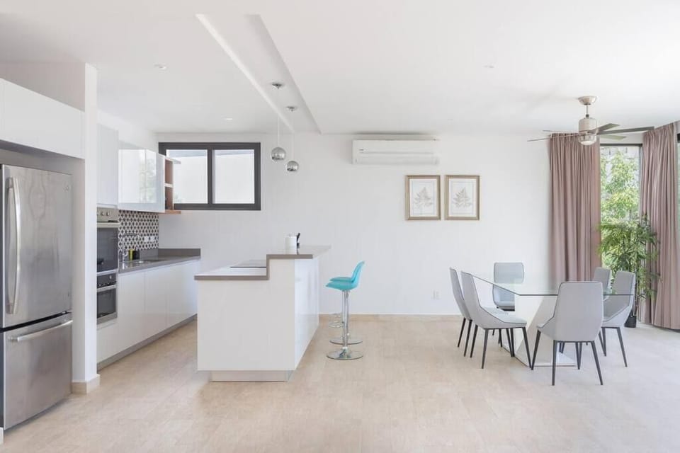 Family Apartment, Garden View | Living area | 50-inch Smart TV with digital channels