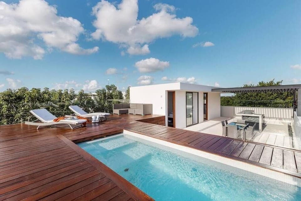 2 outdoor pools, pool umbrellas, sun loungers