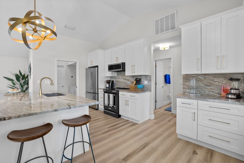 Prepare meals with ease using our modern stainless steel appliances, adding a touch of luxury to every dish.