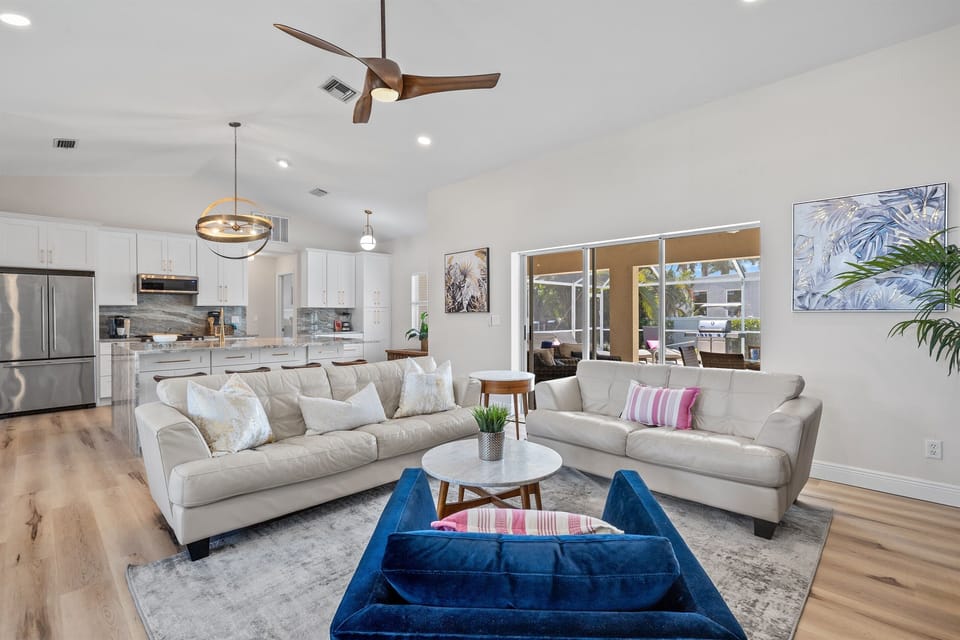 Cozy up in style! Our inviting living room offers the perfect blend of comfort and elegance.