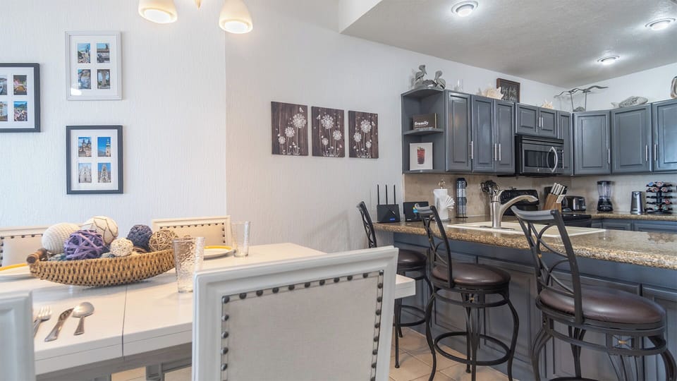 Comfortable bar stools at the counter make the kitchen a fun place to get together.
