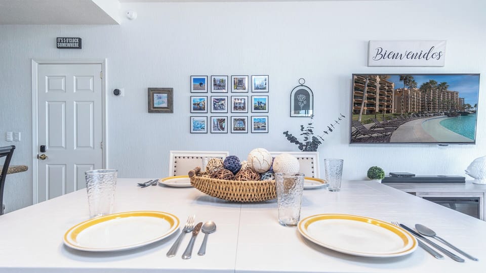 Raised cafe style dining table for four guests.