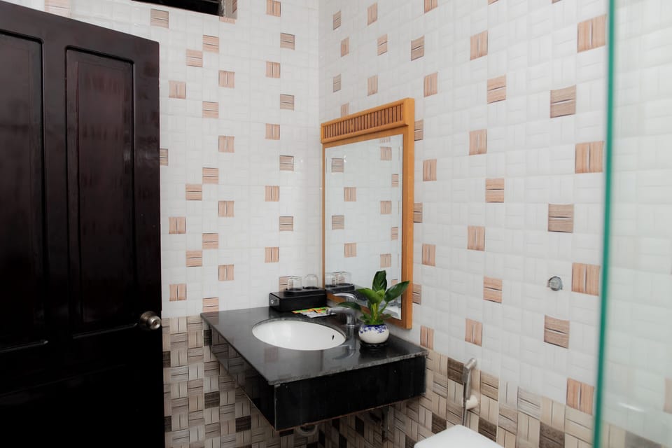 Separate tub and shower, free toiletries, hair dryer, slippers