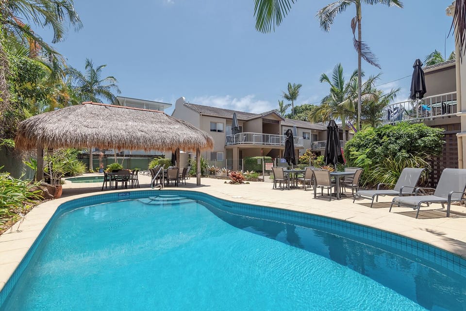 Relax by the shared, heated pool and bbq area