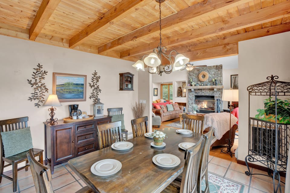 Gather around the dining table for meals, conversation, and lakeside memories.
