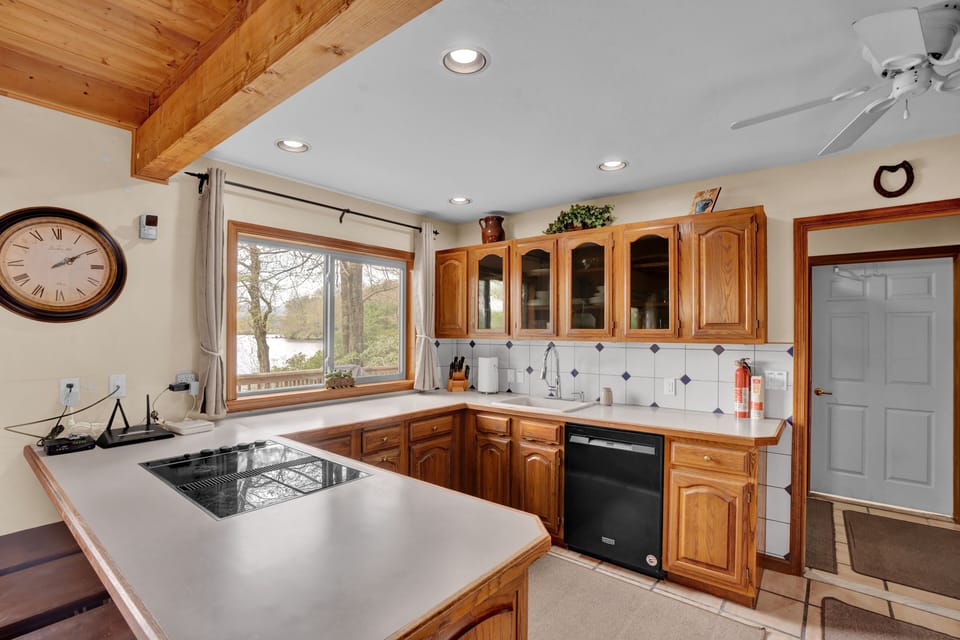 Cook and connect in the spacious kitchen, designed for both functionality and style.
