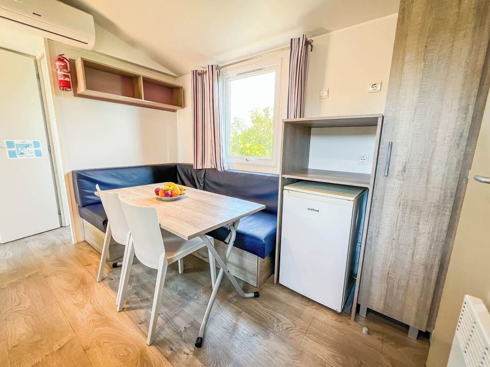 Comfort Mobile Home | Private kitchen | Full-size fridge, highchair, cookware/dishes/utensils