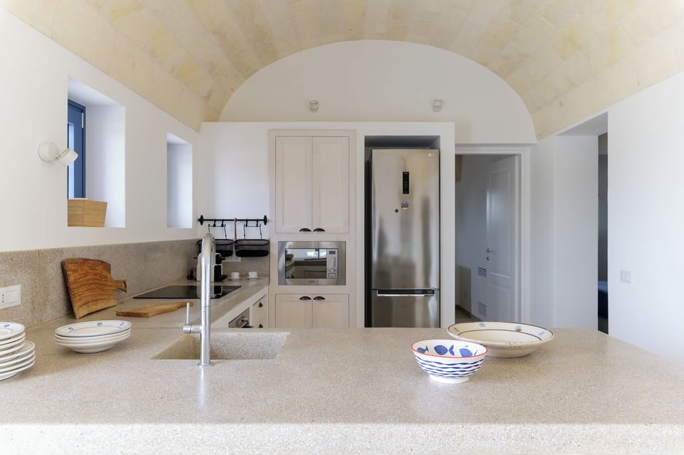 Deluxe Villa, Pool View | Private kitchen | Full-size fridge, microwave, oven, stovetop