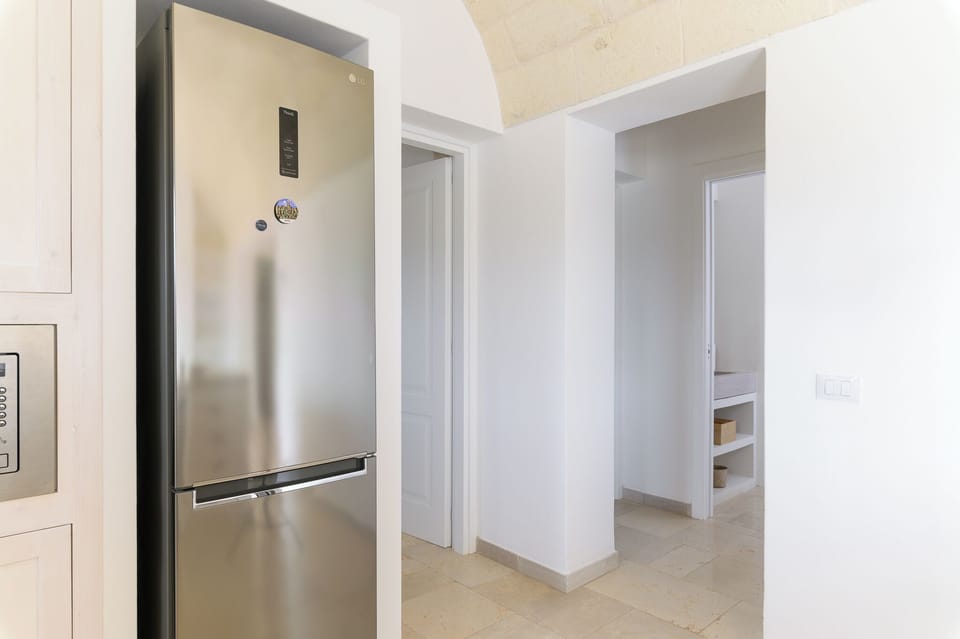 Deluxe Villa, Pool View | Private kitchen | Full-size fridge, microwave, oven, stovetop