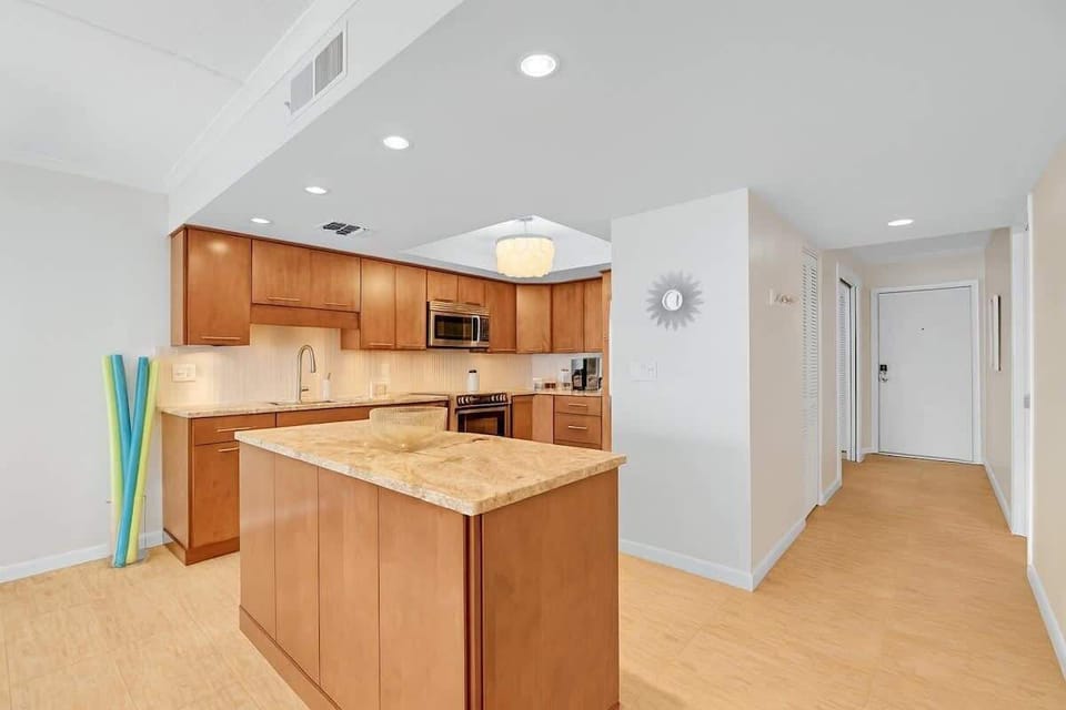 Open Kitchen with Gourmet Cookware.