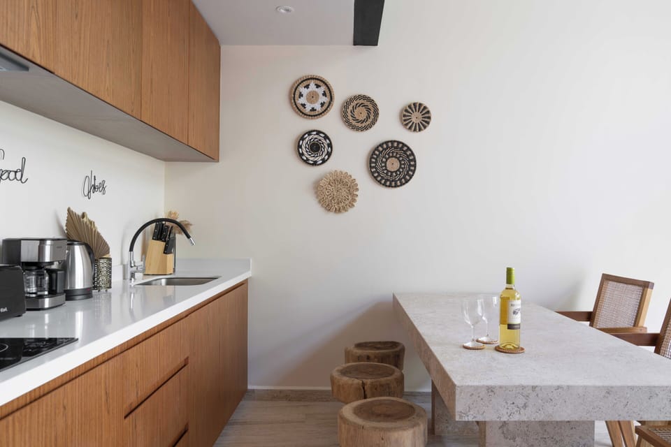 Design Apartment, Garden Area | Private kitchen | Full-size fridge, microwave, coffee/tea maker, blender
