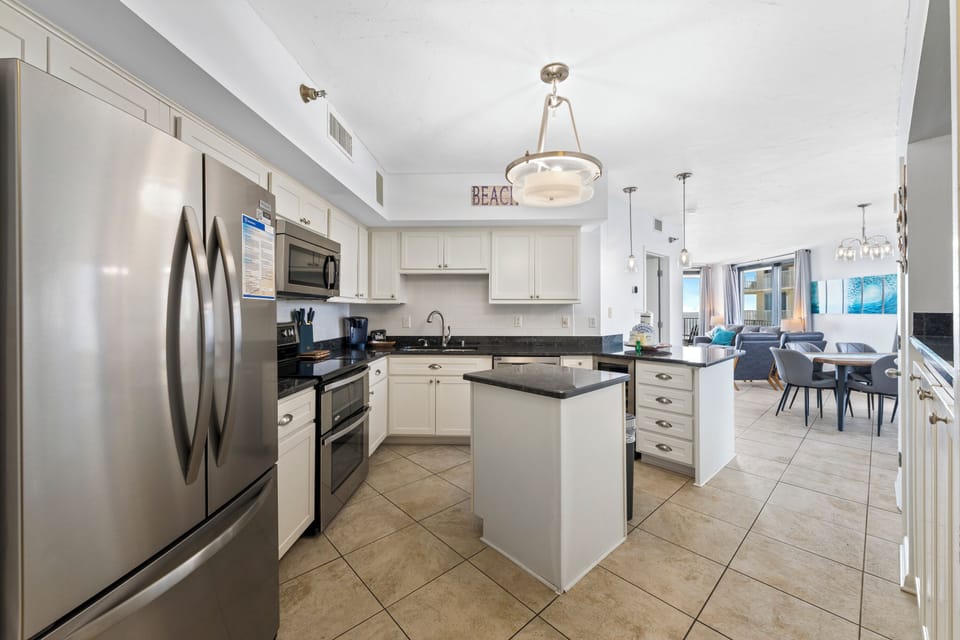 Signature Condo, 3 Bedrooms, Kitchen, Beachfront (Pelican Pointe 506) | Private kitchen | Fridge, microwave, oven, stovetop