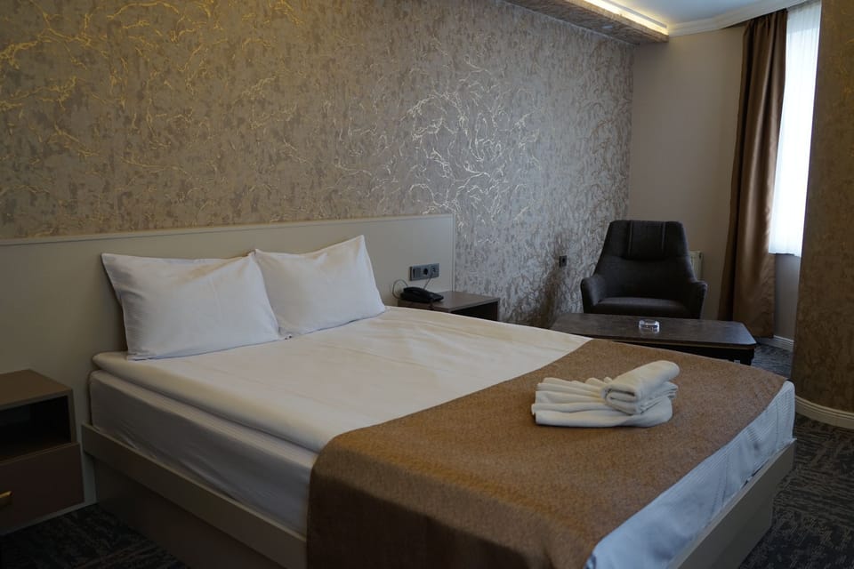 Deluxe Single Room | In-room safe, free WiFi, bed sheets