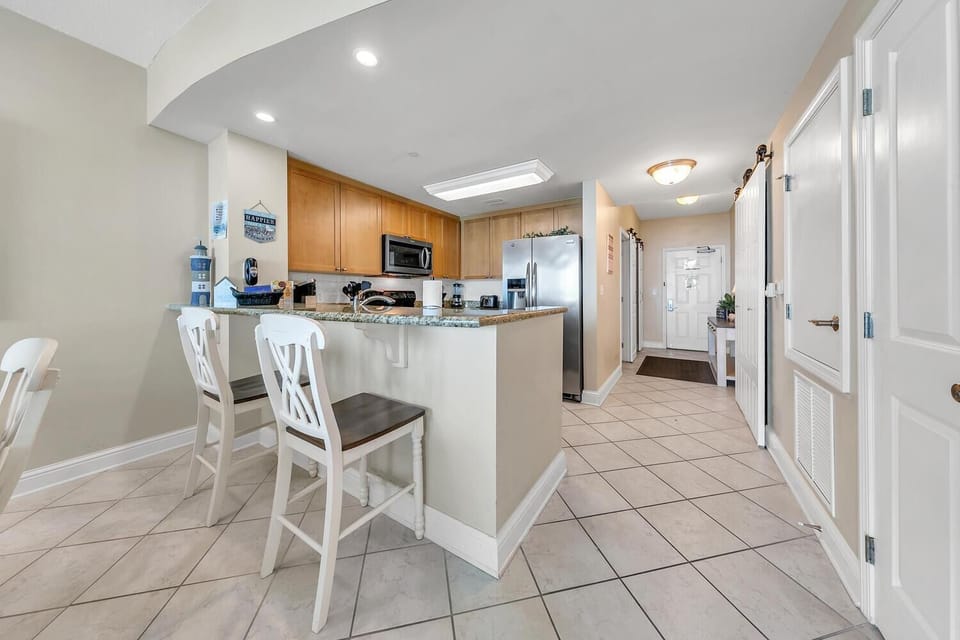 Condo, 1 King Bed with Sofa bed (Aqua Resort 906) | Private kitchen | Oven, toaster, cookware/dishes/utensils