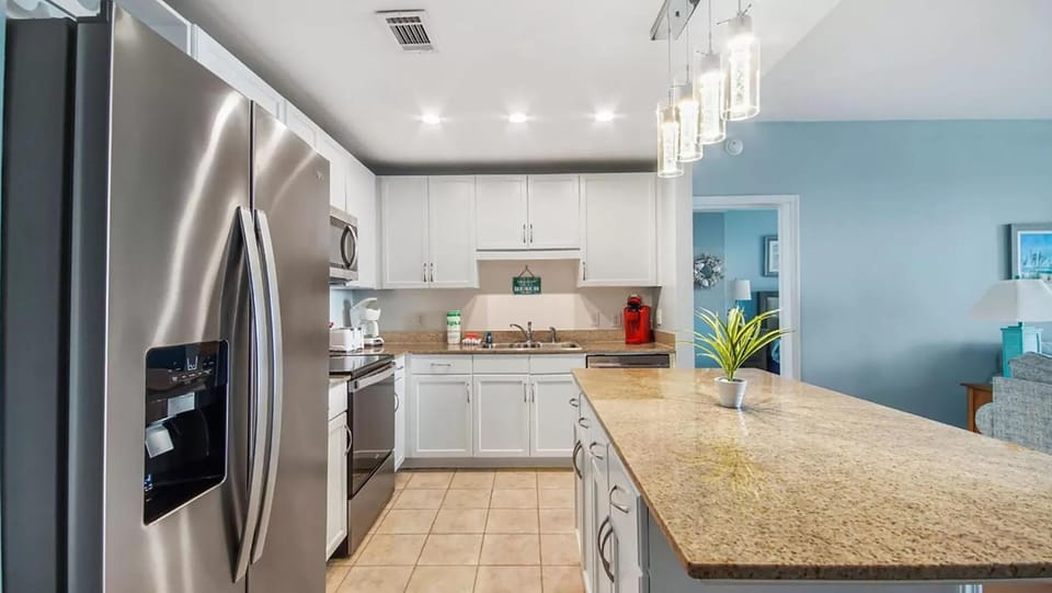 Condo, Multiple Beds (Laketown Wharf 827 - Life's A Beach) | Private kitchen | Oven, cookware/dishes/utensils