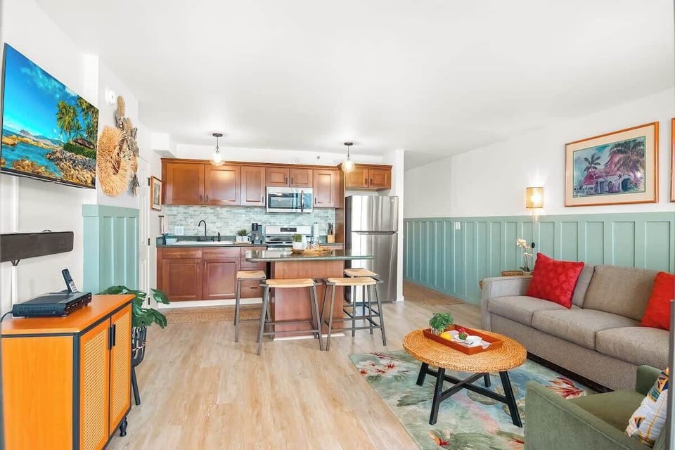 Overview of the living area, dining area, and kitchen