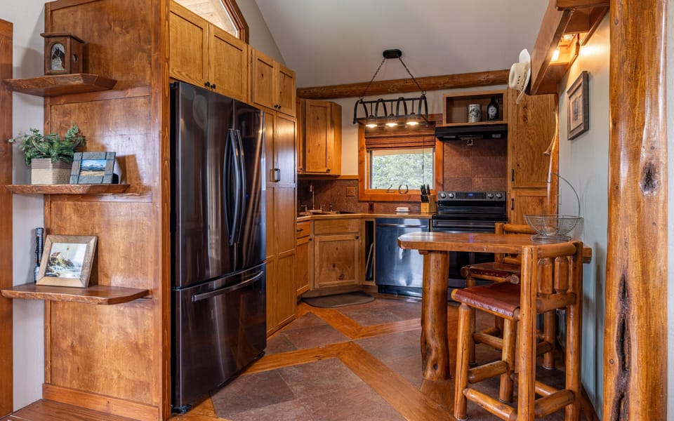 Modern appliances blend with rustic western decor in the kitchen