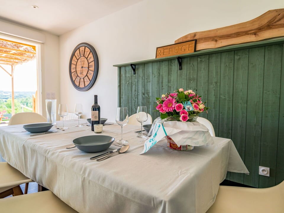 Flower, Table, Building, Plant, Furniture, Window, Textile, House, Wood, Tablecloth