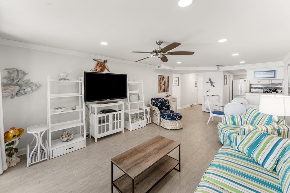 On those windy coastal days, you can open the sliding glass door, turn on your ceiling fan and enjoy the ocean air.
