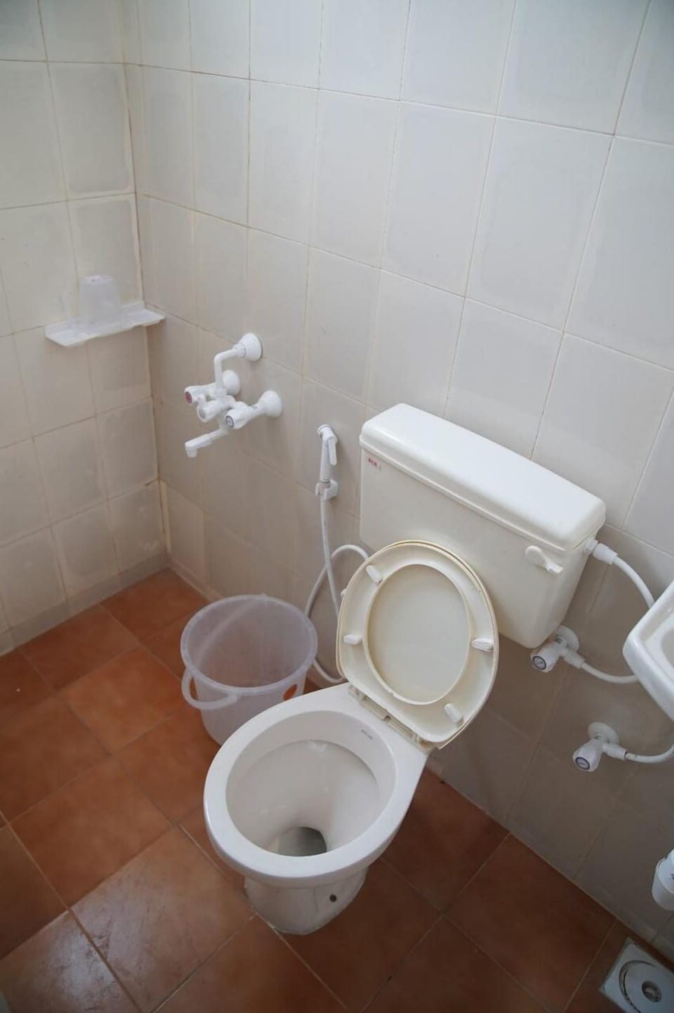 Shower, rainfall showerhead, bathrobes, towels