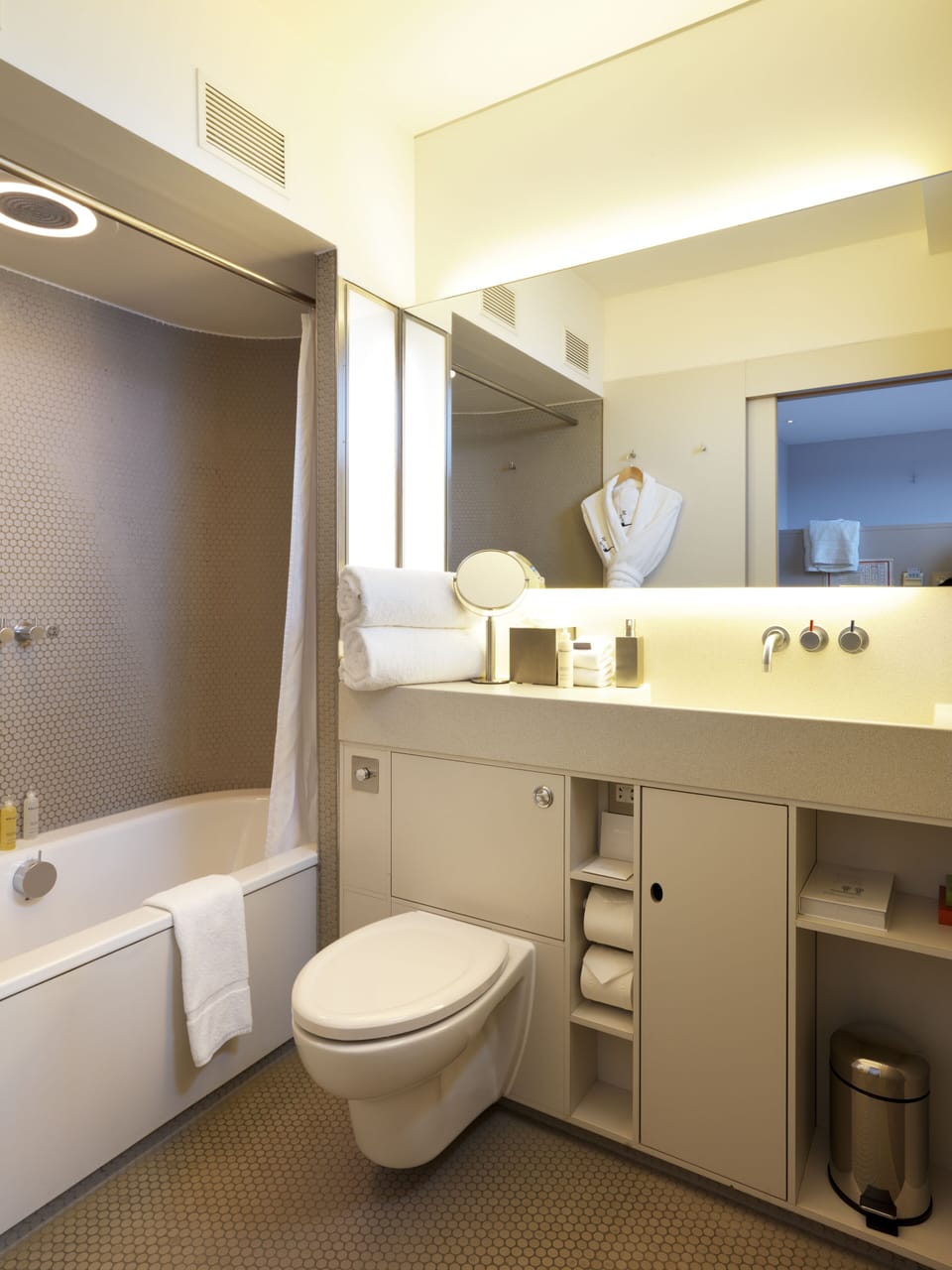 Designer toiletries, hair dryer, bathrobes, towels