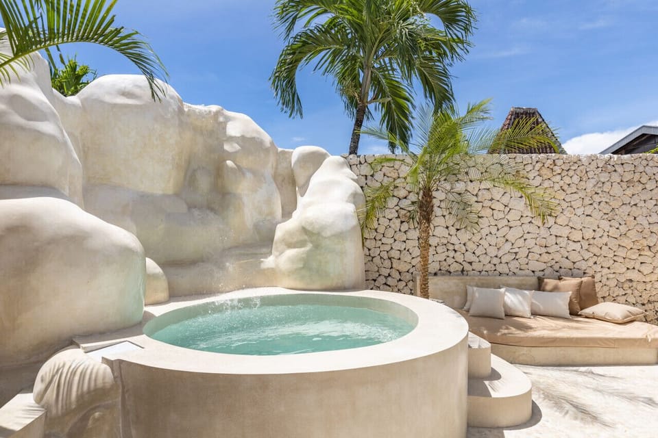 a private pool, inviting relaxation in a sun-kissed retreat.