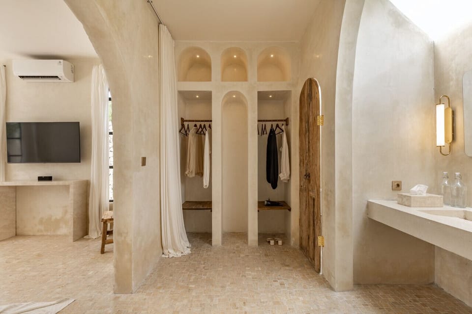 A villa`s dressing area, where rustic charm meets modern design, offering a tranquil space to unwind.