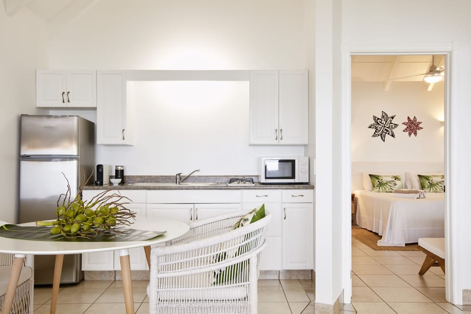 Premium Villa, 1 Bedroom, Beachfront | Private kitchen | Espresso maker, coffee/tea maker, full-size fridge, microwave