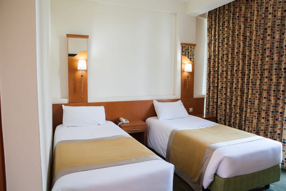 Twin Room, City View | Premium bedding, in-room safe, desk, WiFi (free)