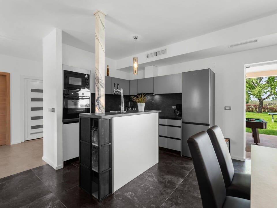 Villa | Private kitchen | Electric kettle, toaster, cookware/dishes/utensils
