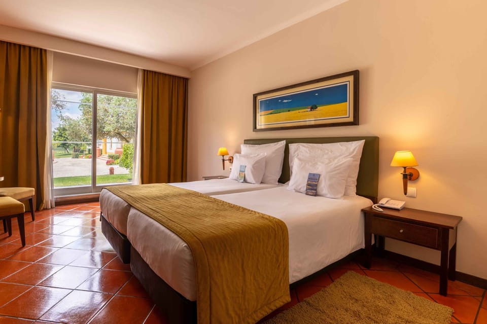 Minibar, desk, blackout drapes, free WiFi