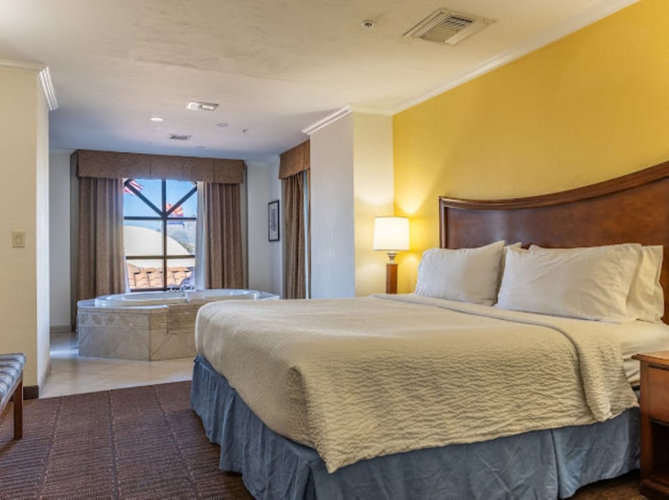 Premium bedding, down comforters, pillowtop beds, minibar
