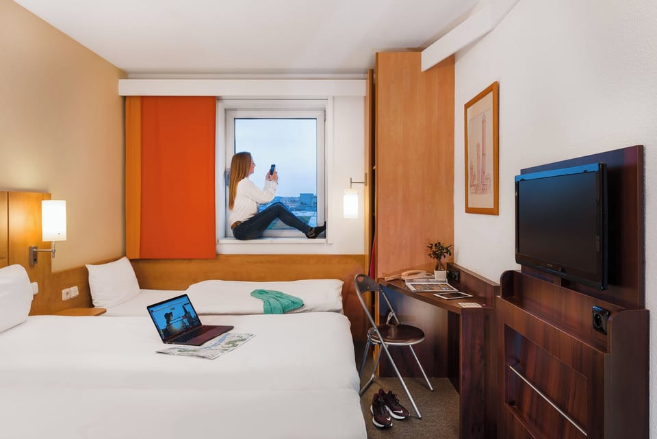 Room, 2 Twin Beds | Desk, blackout drapes, iron/ironing board, free WiFi