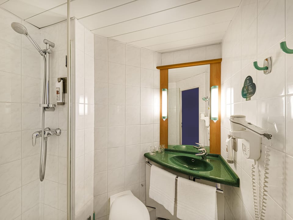 Shower, eco-friendly toiletries, hair dryer, towels