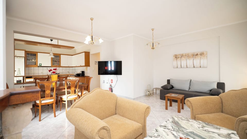 Family Apartment | Living area | Flat-screen TV