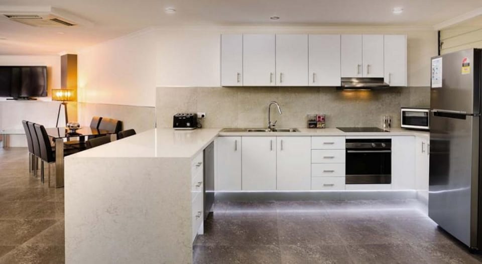 Apartment, 3 Bedrooms | Private kitchen | Full-size fridge, microwave, oven, stovetop